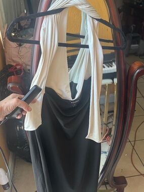 Cute Black and crème Halter dress ! Only used once practically new !